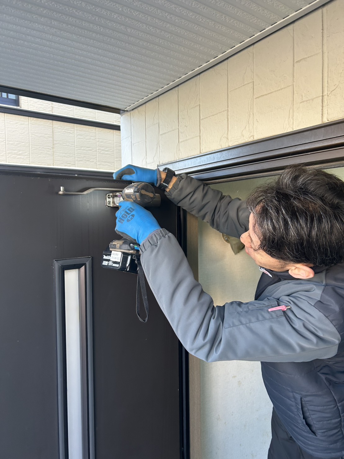 野々市市親子ドア既存ドア撤去写真