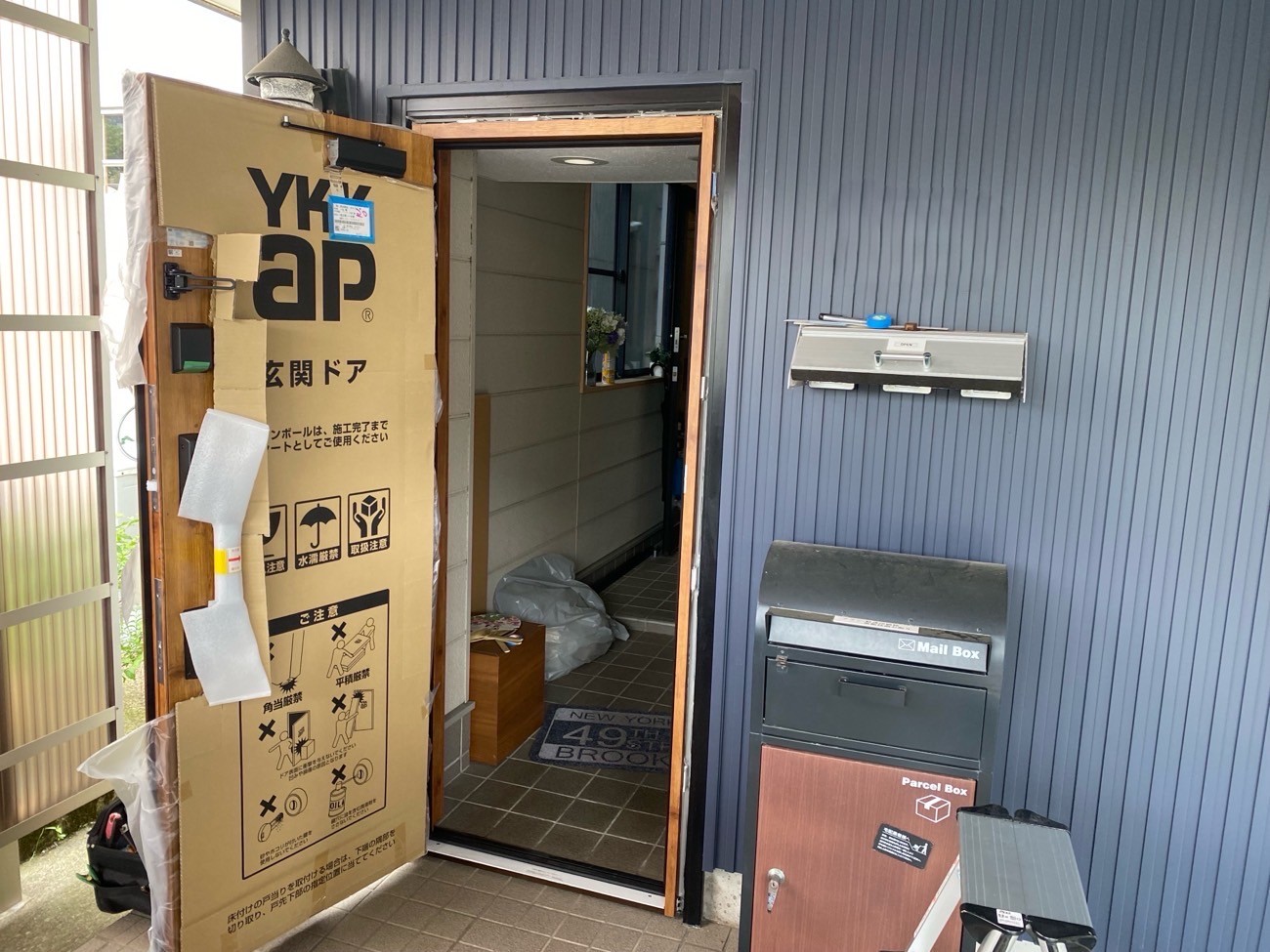 T様邸ドアリモ作業中写真